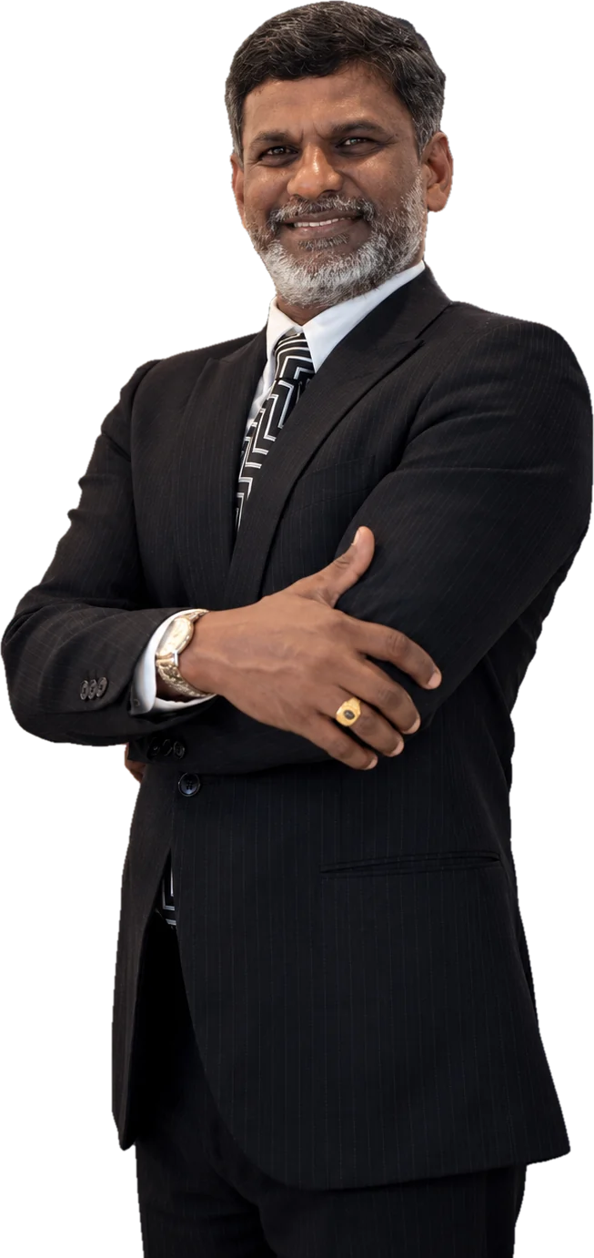 Prof. Sivarao Subramonian smiling with his arms crossed