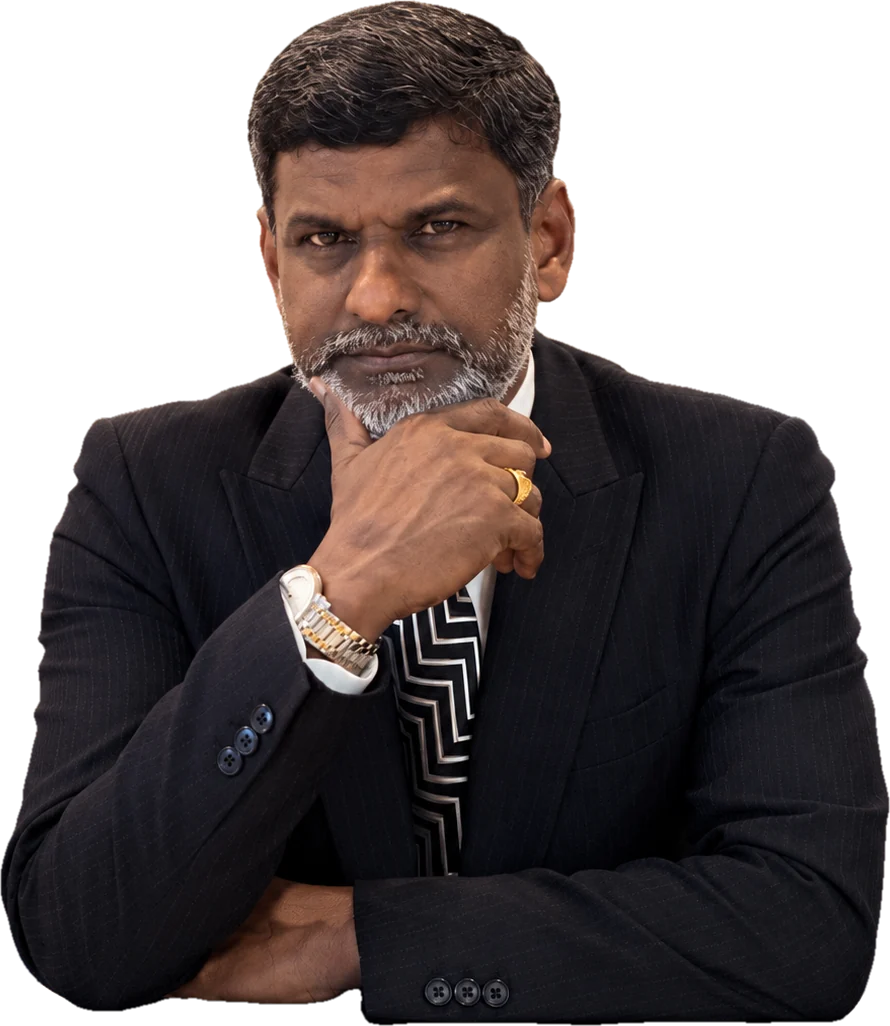 Prof. Sivarao Subramonian seated, chin resting on his hand